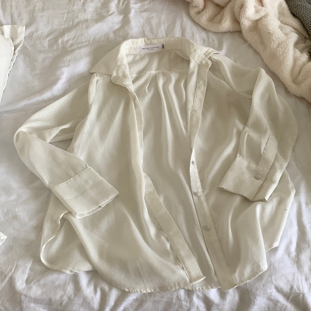 White sheer button shown